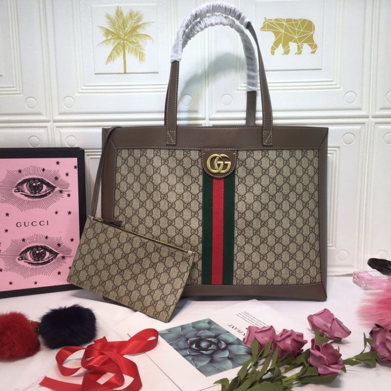 G*u*i shopping bags